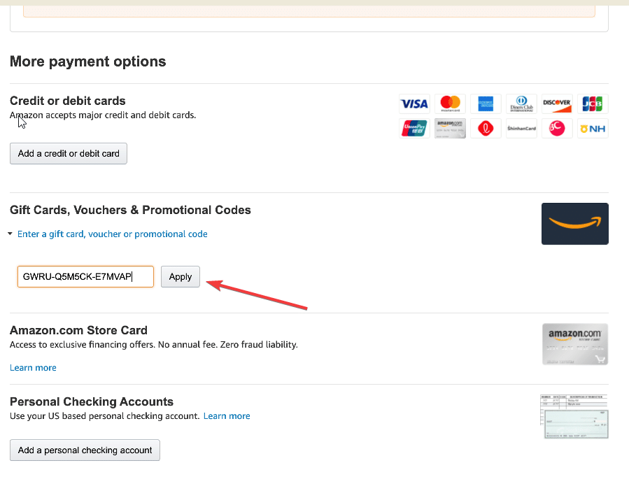 A person using a promotion code to make a payment on Amazon